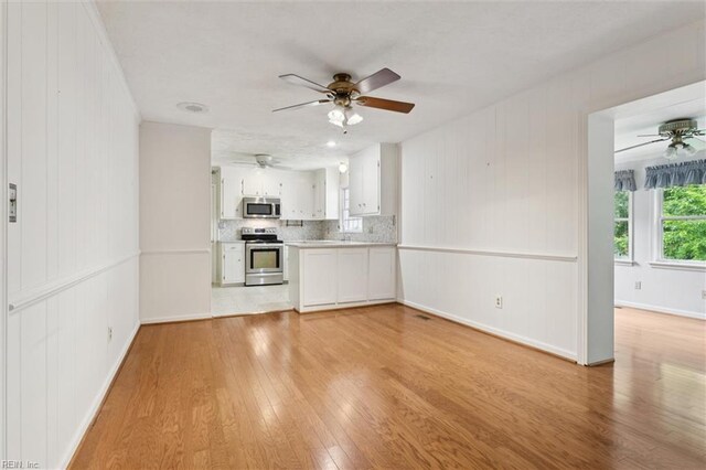 4 Everett Dr, Newport News, VA 23602 - unfurnished living room featuring ceiling fan and light wood finished floors