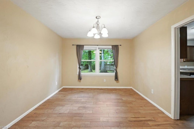 1027 E Little Back River Rd, Hampton, VA 23669 - unfurnished dining area featuring a chandelier and light wood-style floors