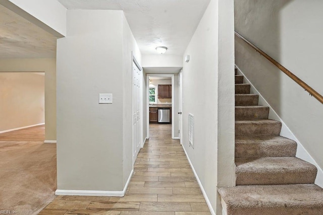 1027 E Little Back River Rd, Hampton, VA 23669 - corridor featuring light wood-style floors and stairs