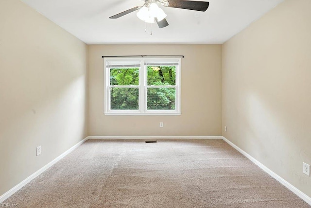 1027 E Little Back River Rd, Hampton, VA 23669 - carpeted spare room featuring a ceiling fan and baseboards