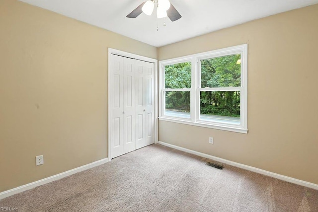 1027 E Little Back River Rd, Hampton, VA 23669 - unfurnished bedroom with a closet, carpet floors, and ceiling fan