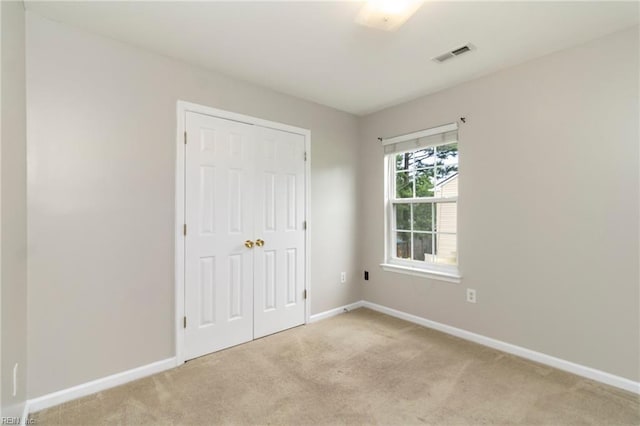 102 Sonoma Ct, Williamsburg, VA 23185 - unfurnished bedroom with light carpet and a closet