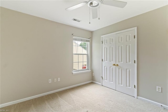 102 Sonoma Ct, Williamsburg, VA 23185 - unfurnished bedroom with carpet flooring, a closet, and a ceiling fan