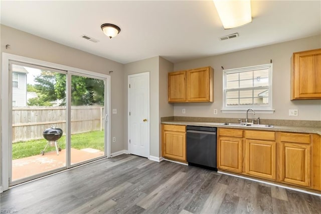 102 Sonoma Ct, Williamsburg, VA 23185 - kitchen featuring dishwasher, dark wood-style flooring, and light countertops