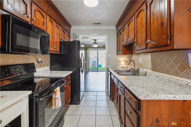 1206 Mabry Mill Pl, Chesapeake, VA 23320 - kitchen featuring black appliances, ceiling fan, light tile patterned floors, light countertops, and decorative backsplash