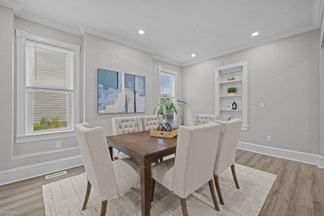 2233 Keller Ave, Norfolk, VA 23509 - dining area with ornamental molding, wood finished floors, and recessed lighting