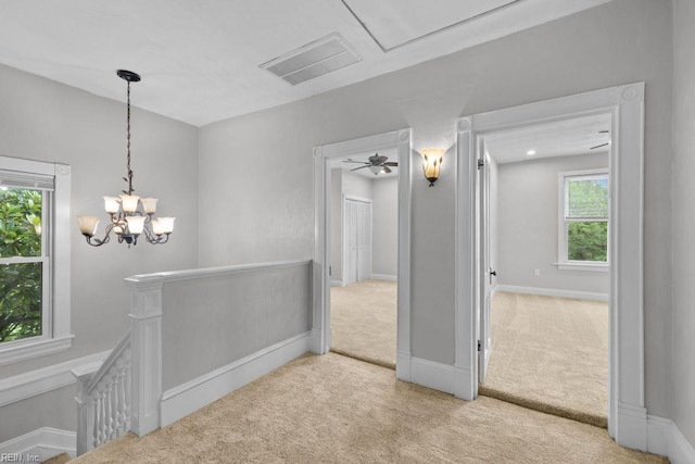 2233 Keller Ave, Norfolk, VA 23509 - corridor featuring an upstairs landing, carpet flooring, and a chandelier
