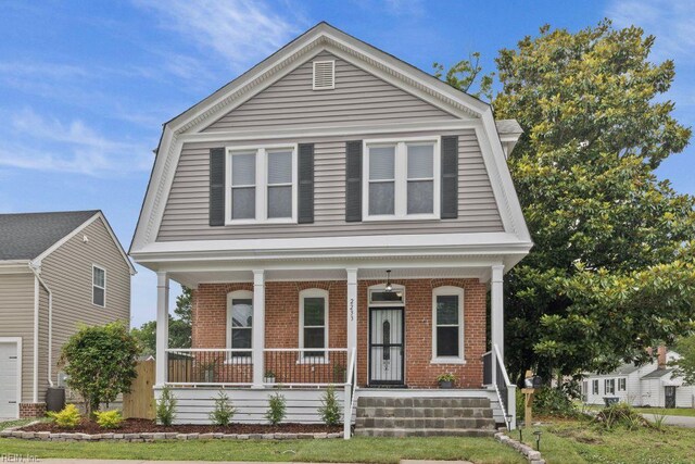 2233 Keller Ave, Norfolk, VA 23509 - view of front of property with a gambrel roof, a porch, and brick siding