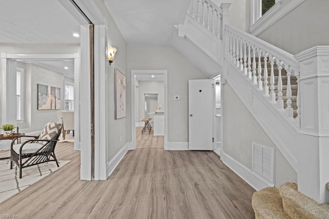 2233 Keller Ave, Norfolk, VA 23509 - foyer with light wood finished floors, stairs, and recessed lighting