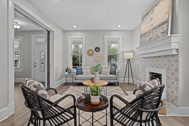 2233 Keller Ave, Norfolk, VA 23509 - living area featuring wood finished floors, a fireplace, and recessed lighting