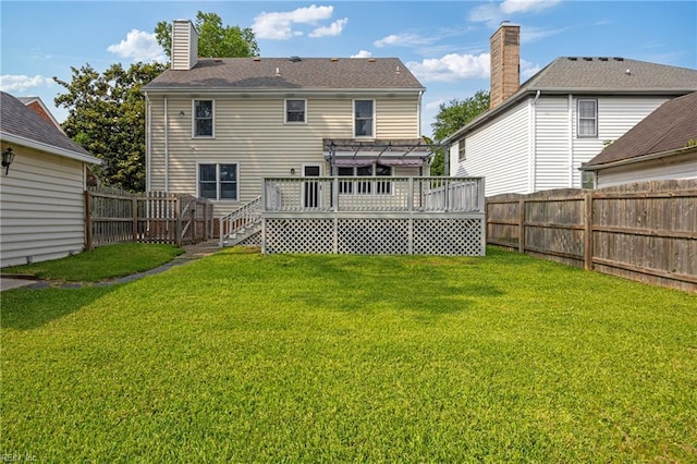 929 Magnolia Ave, Norfolk, VA 23508 - rear view of property featuring a wooden deck, a pergola, a fenced backyard, and a chimney