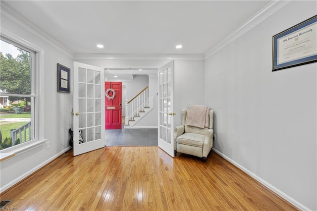 929 Magnolia Ave, Norfolk, VA 23508 - unfurnished room featuring french doors, light wood-style flooring, healthy amount of natural light, ornamental molding, and recessed lighting