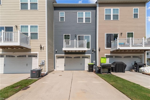 619 Muddy Creek Rd, Chesapeake, VA 23324 - back of property with an attached garage and concrete driveway