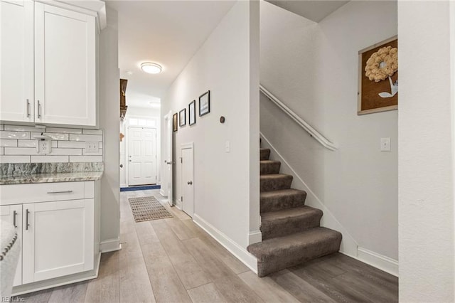 401 W 30th St, Norfolk, VA 23508 - stairs featuring wood finished floors and baseboards