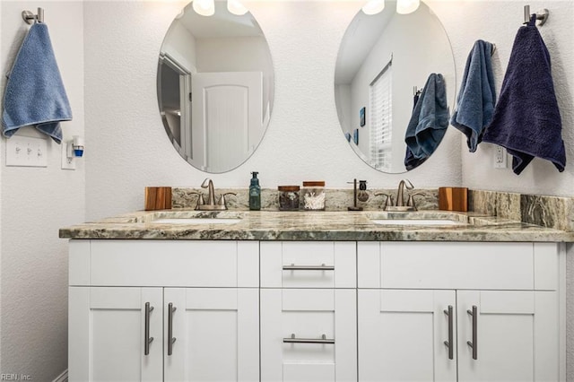 401 W 30th St, Norfolk, VA 23508 - full bathroom featuring double vanity and a textured wall