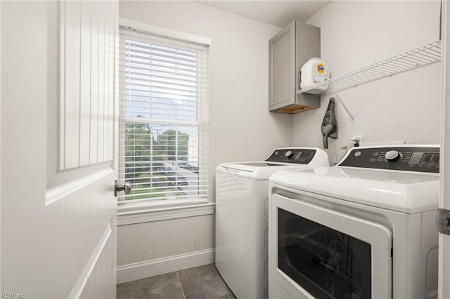 401 W 30th St, Norfolk, VA 23508 - washroom featuring independent washer and dryer, cabinet space, and tile patterned floors