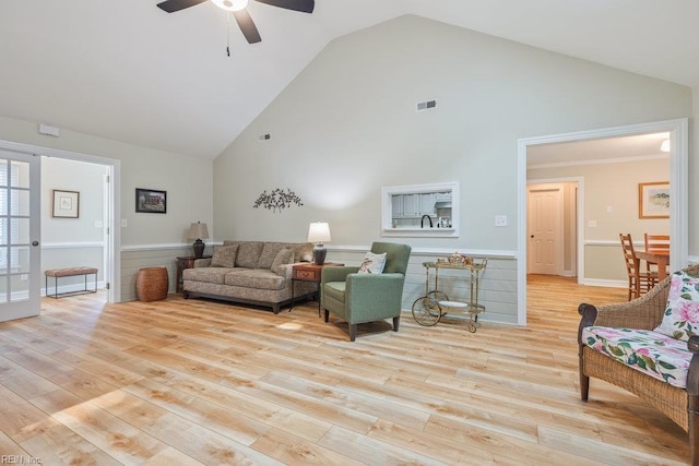 633 Aguila Dr, Chesapeake, VA 23322 - living room with high vaulted ceiling, ceiling fan, and light wood-style floors