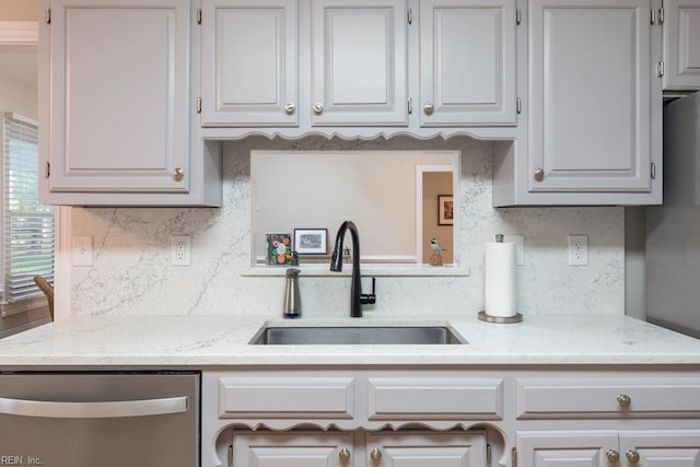 633 Aguila Dr, Chesapeake, VA 23322 - kitchen featuring stainless steel dishwasher, tasteful backsplash, and light stone counters