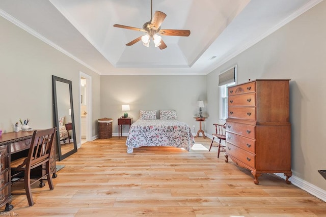 633 Aguila Dr, Chesapeake, VA 23322 - bedroom featuring a tray ceiling, light wood-style floors, ornamental molding, a ceiling fan, and ensuite bath