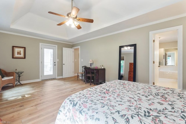 633 Aguila Dr, Chesapeake, VA 23322 - bedroom with a raised ceiling, wood finished floors, ornamental molding, connected bathroom, and ceiling fan