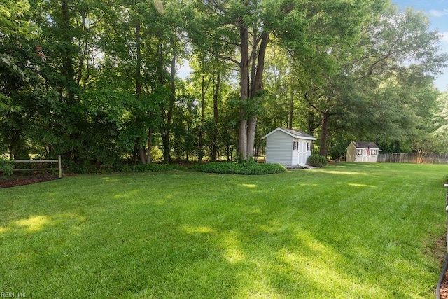 633 Aguila Dr, Chesapeake, VA 23322 - view of yard featuring a shed