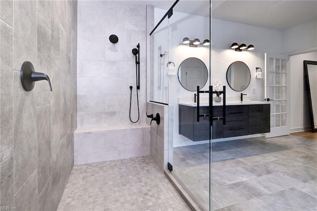 3 Menife Ct, Williamsburg, VA 23188 - bathroom featuring a tile shower and double vanity