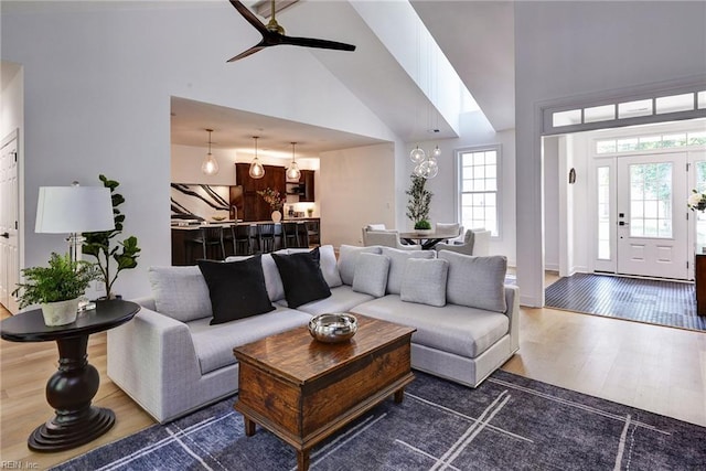 3 Menife Ct, Williamsburg, VA 23188 - living room with high vaulted ceiling, ceiling fan, and wood finished floors