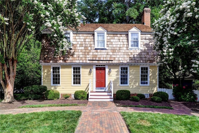 110 Thomas Gates, Williamsburg, VA 23185 - view of front of house featuring a chimney and a front yard