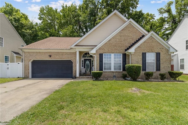 1058 Hillpoint Rd, Suffolk, VA 23434 - view of front facade with brick siding, an attached garage, and concrete driveway