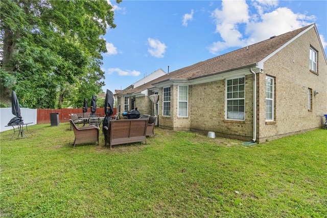 1058 Hillpoint Rd, Suffolk, VA 23434 - rear view of house featuring outdoor lounge area and brick siding