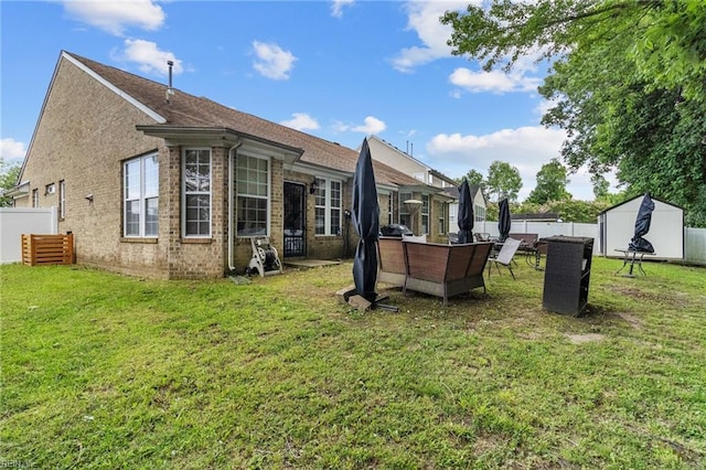 1058 Hillpoint Rd, Suffolk, VA 23434 - back of property with a shed and brick siding