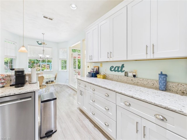 2909 Drum Point Cres, Chesapeake, VA 23321 - kitchen featuring dishwasher, light wood-style flooring, white cabinets, hanging light fixtures, and light stone counters