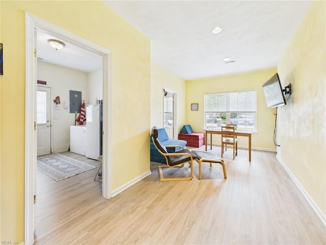 2909 Drum Point Cres, Chesapeake, VA 23321 - living area featuring electric panel, wood finished floors, and washer / clothes dryer