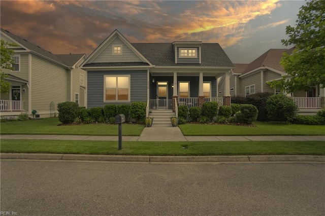 3216 Meanley Dr, Chesapeake, VA 23323 - craftsman house featuring a porch and a front lawn