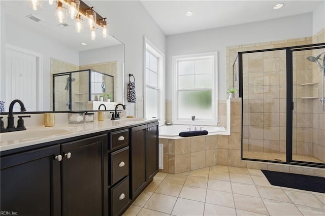 3216 Meanley Dr, Chesapeake, VA 23323 - full bath with a stall shower, a bath, double vanity, tile patterned flooring, and recessed lighting