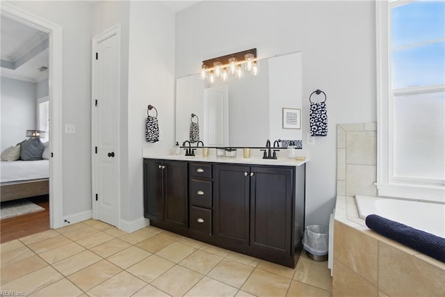 3216 Meanley Dr, Chesapeake, VA 23323 - ensuite bathroom with double vanity, tiled bath, tile patterned flooring, and crown molding