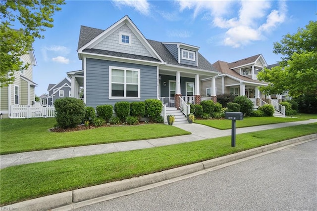 3216 Meanley Dr, Chesapeake, VA 23323 - view of front facade featuring covered porch and a shingled roof