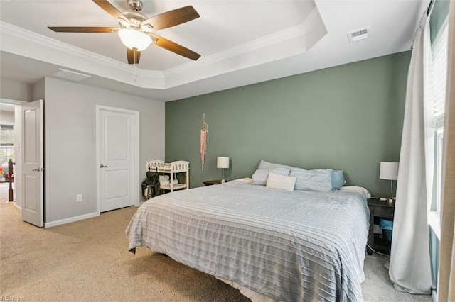 112 Mccormick Pl, Williamsburg, VA 23185 - carpeted bedroom with a tray ceiling, ornamental molding, and a ceiling fan