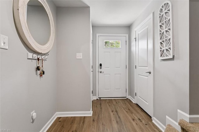 112 Mccormick Pl, Williamsburg, VA 23185 - foyer entrance with wood finished floors and baseboards