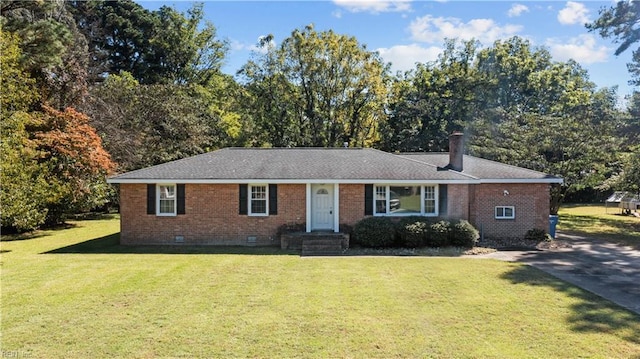 2309 Drum Creek Rd, Chesapeake, VA 23321 - ranch-style house with crawl space, brick siding, a front lawn, a chimney, and view of wooded area