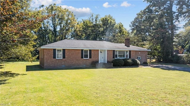 2309 Drum Creek Rd, Chesapeake, VA 23321 - ranch-style house with crawl space, a front yard, brick siding, a chimney, and view of scattered trees