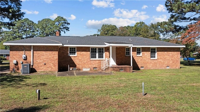2309 Drum Creek Rd, Chesapeake, VA 23321 - back of house with a lawn, a patio area, brick siding, crawl space, and a chimney