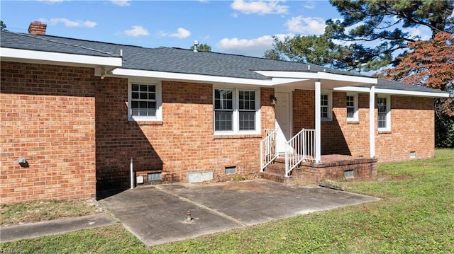2309 Drum Creek Rd, Chesapeake, VA 23321 - rear view of property with a lawn, crawl space, brick siding, and a patio area