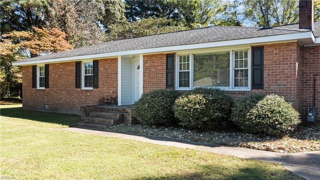 2309 Drum Creek Rd, Chesapeake, VA 23321 - ranch-style home with a front yard, brick siding, and a chimney