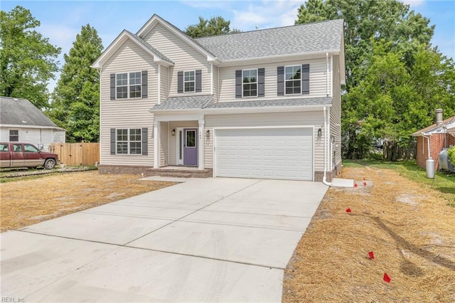 3334 Sleepy Hole Rd, Suffolk, VA 23435 - traditional home with concrete driveway, a garage, and a shingled roof