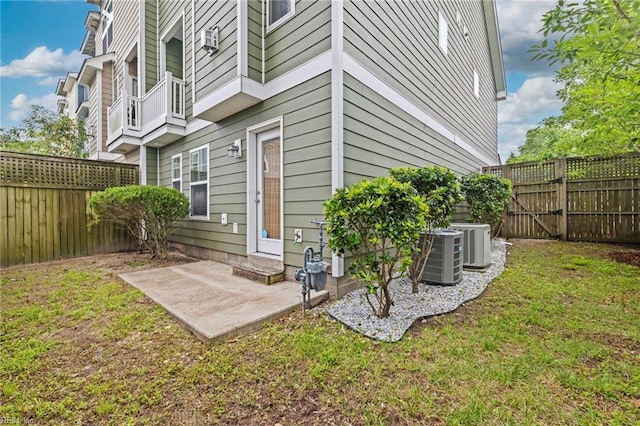 616 Foster Ln, Virginia Beach, VA 23451 - view of side of property featuring a fenced backyard, a patio, and a wall mounted AC