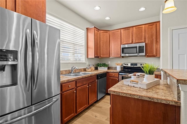 616 Foster Ln, Virginia Beach, VA 23451 - kitchen featuring appliances with stainless steel finishes, light wood-type flooring, recessed lighting, light countertops, and pendant lighting