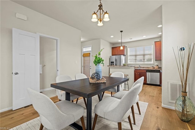 616 Foster Ln, Virginia Beach, VA 23451 - dining space featuring a chandelier, light wood-style flooring, and recessed lighting