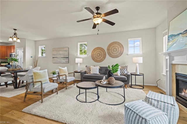 616 Foster Ln, Virginia Beach, VA 23451 - living room featuring a fireplace, light wood-style flooring, and a ceiling fan