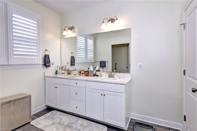 3998 Isaac Cir, Williamsburg, VA 23188 - full bath with double vanity and wood finished floors